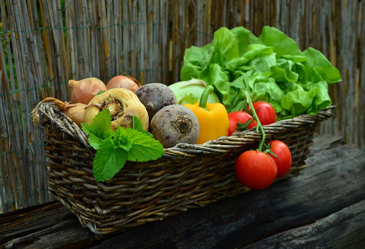 Picture of various vegetables in a basket.